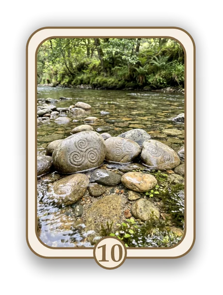 Celtic 10 memorial card design — river stones carved with Celtic spirals